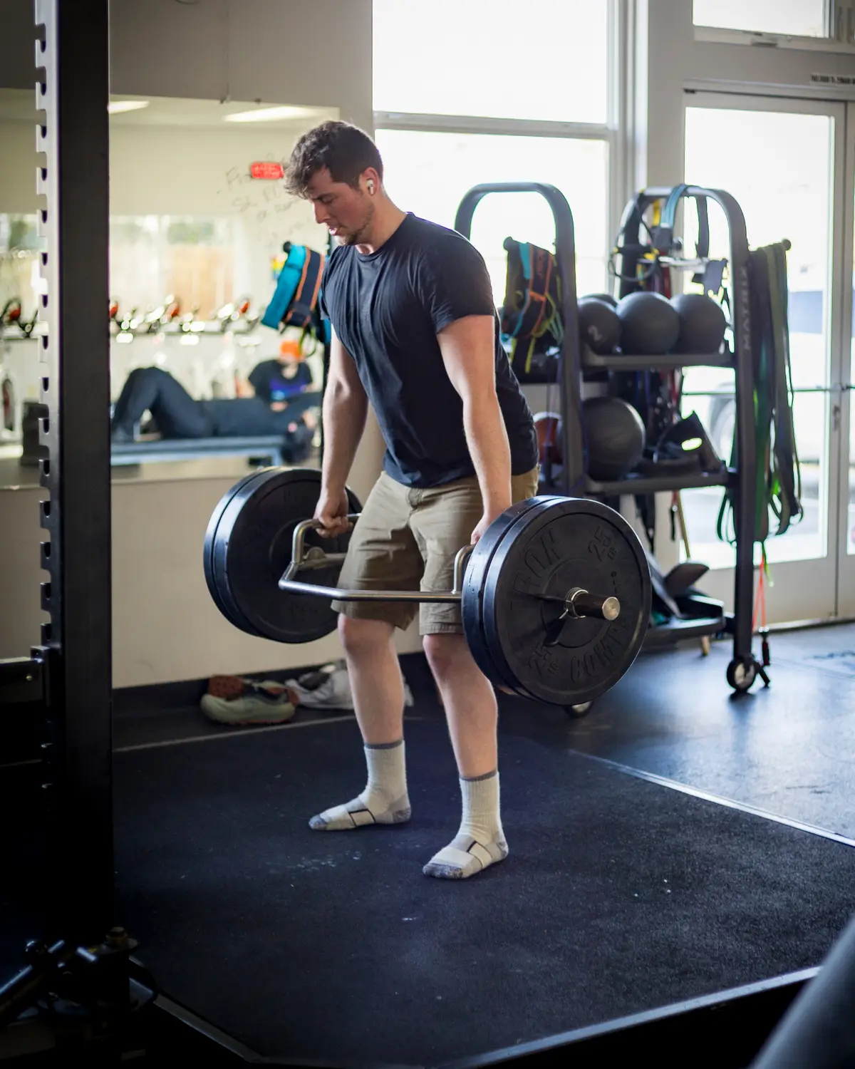 Member training with a trap bar deadlift