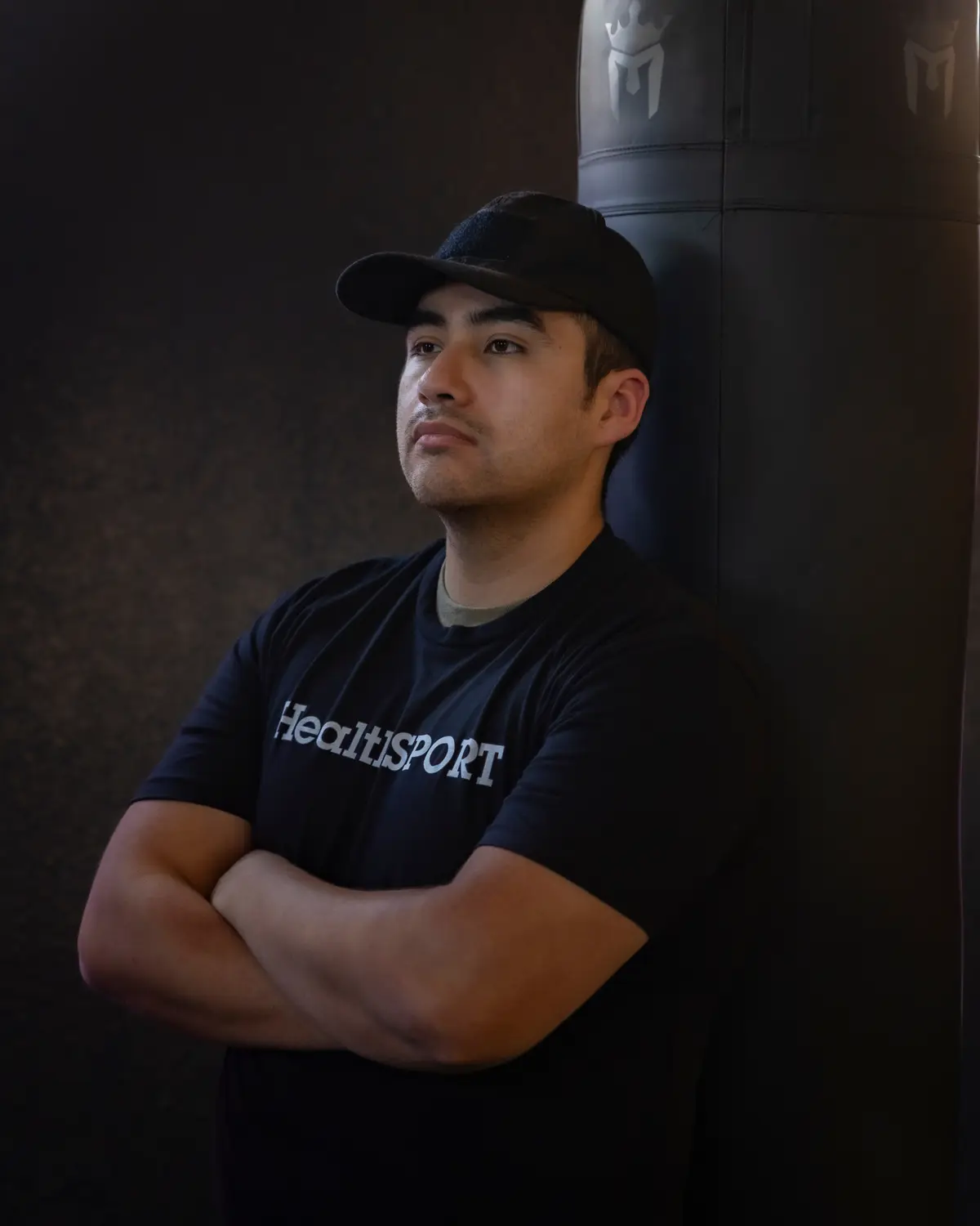HealthSPORT member at the heavy bag