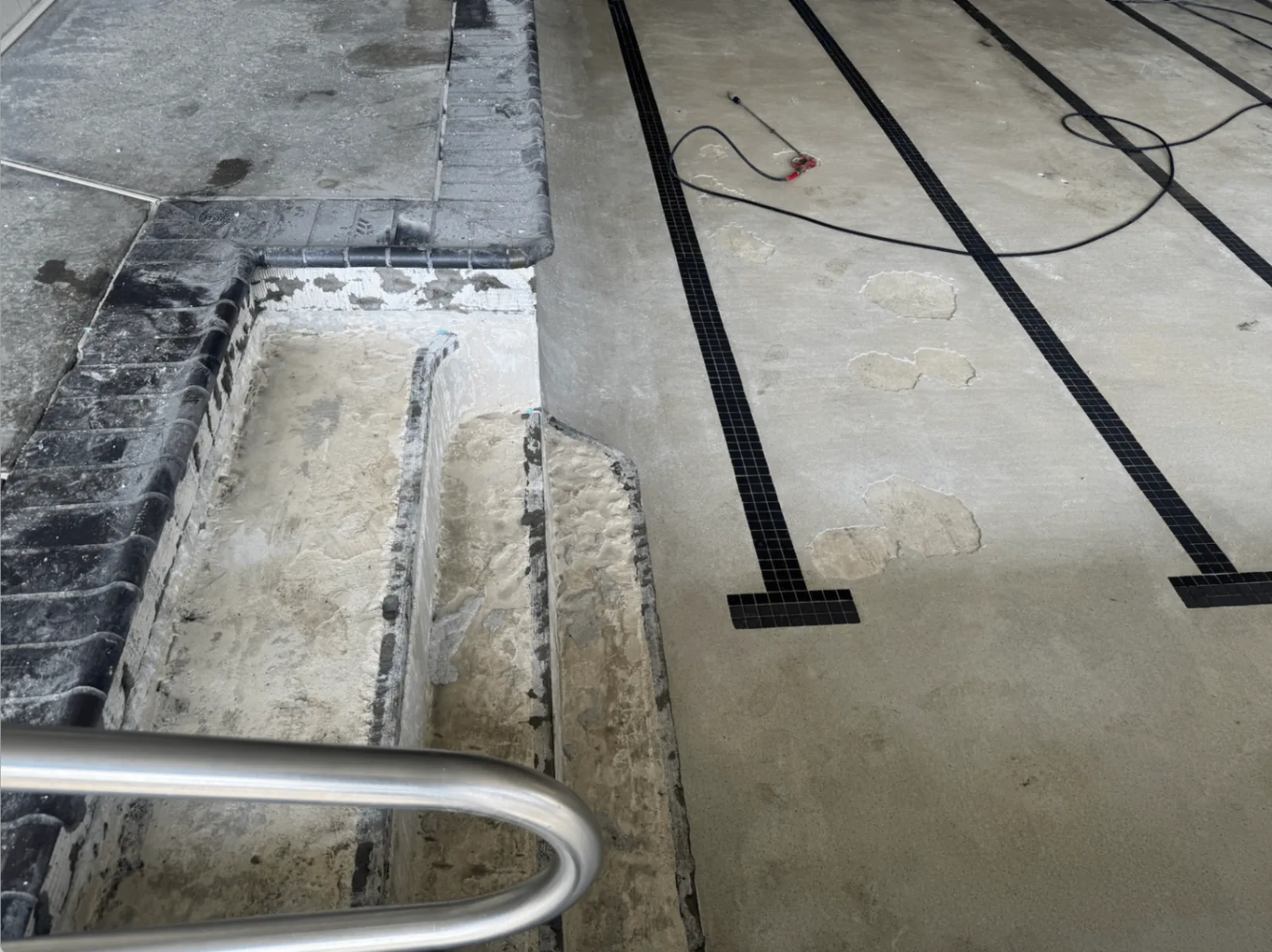Arcata pool steps and lane markings exposed during renovation work